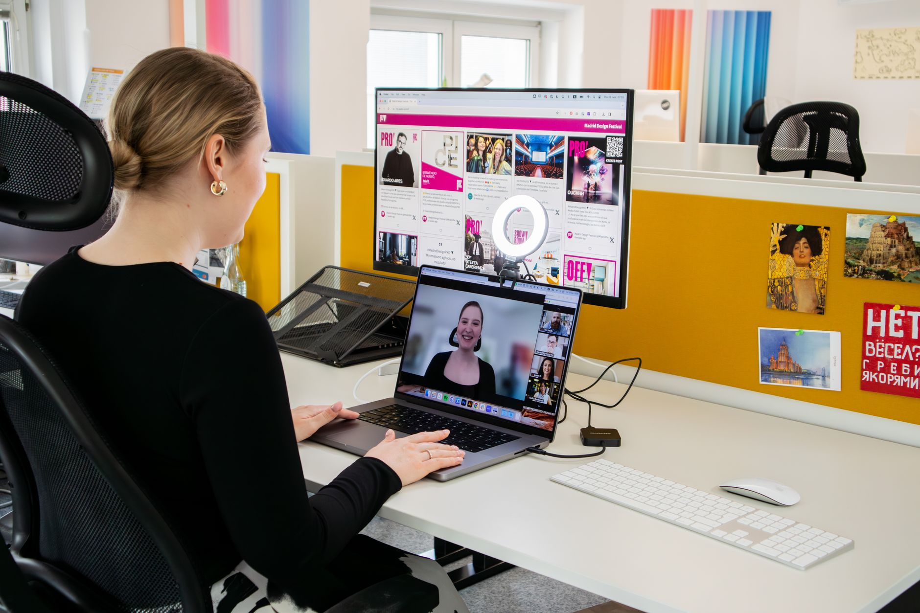 Woman video calling client from home workspace